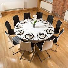 A classic silhouette and white lacquered finish makes this table. Round Dining Table For 8 People Ideas On Foter In 2021 Round Dining Room Table Large Dining Room Table Round Dining