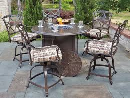 Fire pit tables have gained popularity as more people are bringing indoor living spaces to the outdoors. Outdoor Bar Height Table And Chairs With Fire Pit Off 69