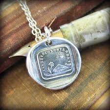 This Wax Seal Necklace Depicts A Flower And Sun The Flower Is Bending Towards The Sun Surrounded By The Italian Ca Wax Seal Necklace Wax Seal Jewelry Necklace