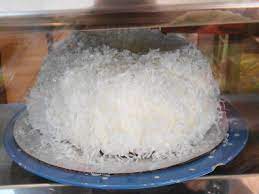 Leave the cakes to cool in the tins for 5 minutes, then carefully turn out onto a wire rack and leave to cool completely. Doans Bakery White Chocolate Coconut Cake Recipe Cake Walls