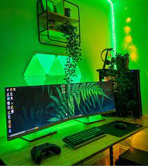 The blue and pink rgb light illuminates the entire setup from the desk to the background. One Of The Best Green Gaming Pc Setups Loot Haus