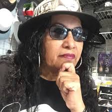 What is the most convenient and cost-effective way to transport a family of  eight from Tijuana airport to Otay pedestrian crossing?