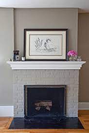 I chose to paint the brick instead of using a stain because i wanted a more drastic change. Sneak Peek Susan And Parker Hutchinson Brick Fireplace Makeover Painted Brick Fireplaces Painted Brick Fireplace