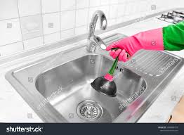 rubber pump cleaning kitchen sink stock