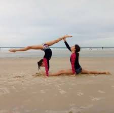 Level 6 Gymnast Lia Cook With Her Sister And Former Gymnast Annie At Salt Beach Kingscliff Great Photo Girls Beachgymnast Beach Gymnastics Gymnastics Photo