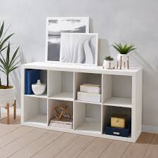 Either fill the shelfs or get baskets to put in the slots. Better Homes Gardens 8 Cube Storage Organizer Multiple Finishes Walmart Com Walmart Com