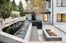Pick a building material that will work with the look and feel of your yard. 10 Contemporary Retaining Walls Offer Fresh Ideas For Slopes