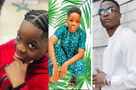 On 7 may 2016, wizkid announced the signings of efya, r2bees, and mr eazi; Yycn7 Hw3mdq M