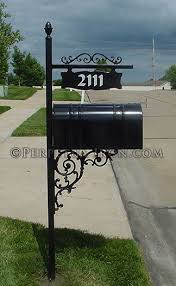 A demonstration of how the slide me out mailbox mounting bracket works. An Ornamental Iron Mailbox Post With Cast Iron Brackets For Hanging Sign Wrought Iron Mailbox Diy Mailbox Mailbox