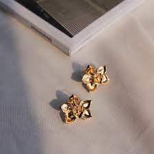 Well Our Idea Of Taking A Day Off From Jewellery Is Wearing These Tiny Cymbidium Orchid Studs Risissg Myri Floral Jewellery Fashion Earrings Earrings