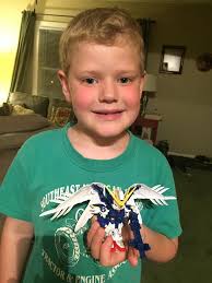 I used pieces from a Gundam kit and vintage toys to make this mecha robot.