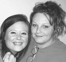 Students literally giving a helping hand to children