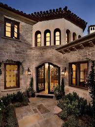 The turret in the background, the retaining walls leading into the front entrance, roof tiles and windows really give off the authentic spanish vibes. 40 Spanish Homes For Your Inspiration