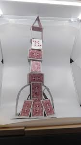 They perhaps signal the same figures we see chained in the devil card earlier. Card Sculpture Bulb