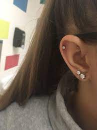 Best Locations For Small Tattoo Designs Tattoos For Women In 2021 Earings Piercings Ear Peircings Ear Piercings Helix
