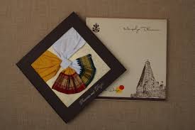 South Indian Traditional Wedding Invitation That Depicts Saree Indian Wedding Invitation Cards Wedding Invitation Cards Handmade Wedding Invitation Card Design
