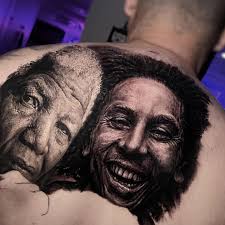 Portrait back piece in progress with this recent Bob Marley. Nelson Mandela  portrait a few months healed. Thank you again Raymond for the trust