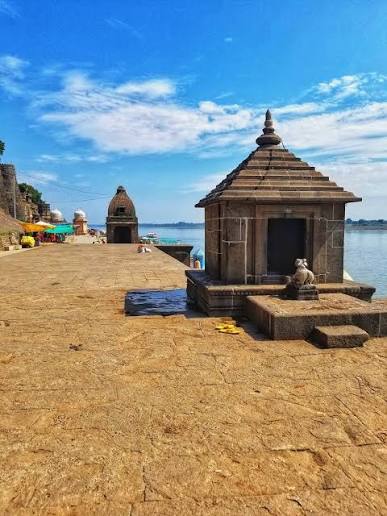 Photograph of the ghats and temples on the River Sipra at Ujjain, taken by George Edward Herne in 1869.