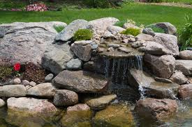 Zone a small garden with decking. The Best Rockery Design For Your Small Garden New Life Rockeries