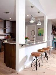 A solid island design would have overwhelmed this small kitchen layout, but open shelving keeps the space looking light and airy. Open Kitchen Designs With Island Whaciendobuenasmigas