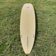 SOLD) 9'0” John Mantle. This is a 9'0” John Mantle performance log meant  for speeding and cruising. Nice rails and as well as volume in the nose  that turns this board into
