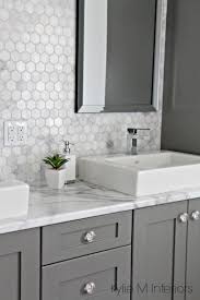 Bathroom With Fake Marble Countertop And Real Marble Backsplash Bathroom Countertops Bathrooms Remodel Gray And White Bathroom