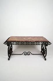 In stock & ready for delivery. Art Deco Style Wrought Iron Coffee Table With Marble Top 1940s For Sale At Pamono