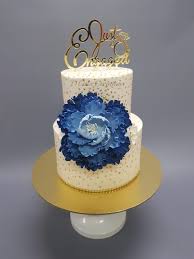 Each of our engagement cake design contains a ring box with a ring in it. Engagement Cakes D Cake Creations