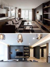 A Simple Color Palette And Hidden Lighting Has Been Used Throughout The Design Of This Apartment Brown Living Room Modern Apartment Apartment Living Room