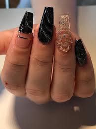 Black And Gold Nails Coffin Amazing Black Marble Nails With Gold Foil Accent Nail In Coffin Shaped Winternails Winternailcolors Winter Black Marble Nails Gold Acrylic Nails Gold Nails