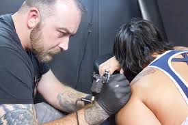 Carved Ink Studio hosts flash fundraiser for Grass Roots Rescue