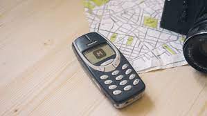 Nokia 3310 On A Wooden Desk Nokia Wooden Desk Free Mockup Templates