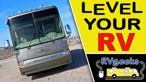 How to operate manual stabilizer jacks crank power drill service scissor jack dodd rv maintenance. How To Level A Motorhome Youtube