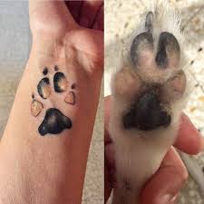 There are many paw print tattoo designs and you can get many dog paw tattoo ideas by looking at tattoos other dog lovers have gotten. People Are Branding Themselves With Dog Paw Tattoos