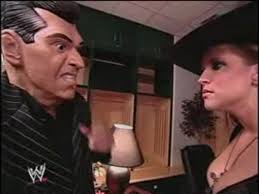 Eric Bischoff & Stephanie McMahon kiss
