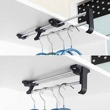 Without essential closet organizers and a streamlined storage system, your bedroom closet can become a messy, disorganized disaster no matter how carefully you fold your clothes or hang them. High Quality Retractable Iron Art Wardrobe Clothes Hanger Pull Out Closet Rod Rail Organizer Rack Storage Holders Racks Aliexpress