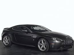 Image result for Jet Black 2010 Aston Martin