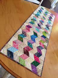 Cool Summer Table Runner Made From My Shop Hop Batik Scraps Pattern Used Was Seaside By Jaybird Quilts Quilted Table Runners Table Runner Diy Table Quilts