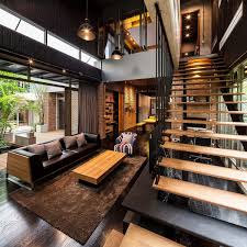 The industrial interior design first blossomed in the early 70s when old factories, warehouses and mills were closing down. Industrial And Modern Side By Side Two Houses In Bangkok Modern House Design Interior Architecture Design House Design