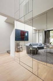 28 mirror wall interior design pictures. Making Mirrored Walls Modern Seven Ideas To Steal Mirror Design Wall Mirror Wall Living Room Mirror Wall Tiles