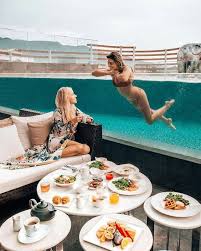 The 12 Beauty Products You Need On Beach And Pool Days Whatsupshoptravel Glass Pool Dream Pools Pool