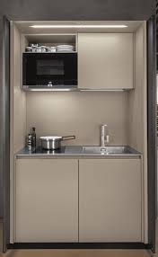 Hideaway Mini Kitchen Cabinet By Euromobil Design Roberto Gobbo Mini Kitchen Kitchen Cabinets Hidden Kitchen