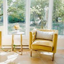 Hollywood regency style took over in the 40s and 50s and if you love a good throwback, this is an uber stylish way to go. Bendell Yellow Velvet Tufted Accent Club Chair With Gold Legs Accent Chairs Yellow Accent Chairs Living Room Accents
