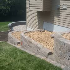 A standard detail for new basement walkout requires underpinning the existing foundation. Photo Gallery Rock Solid Landscape Irrigation