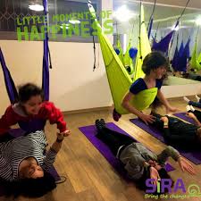 Aerial Yoga Improves Flexibility You Are Able To Move More Freely With Less Effort By Counteracting Gravity Aerial Yoga Yoga For Kids Shoulder Flexibility
