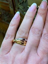 Maybe you would like to learn more about one of these? Cartier 18 Carat Gold Trinity Ring At 1stdibs