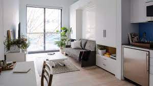 Mike's small new york apartment is an airy, calm and organised space with masses of clever storage solutions. Small Space Living In Micro Apartments Nyc Architectural Digest