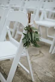 Today i'm sharing two free editable downloads that you can print at home and turn into your own custom wedding ceremony chair reserved signs! Simple Greenery Details On White Chairs For Wedding Ceremony By Jess Craven