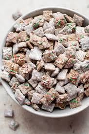 Pour over chex cereal, put into a large plastic bag with powdered sugar and shake well to coat. This Christmas Puppy Chow Mix With Powdered Sugar Gluten Free Rice Chex Cereal And Plent Puppy Chow Recipes Puppy Chow Chex Mix Recipe Gluten Free Puppy Chow