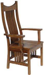 The dining chairs, with their modern farmhouse design, bring rustic style to family gatherings. Cherry Western Dining Room Chair With Arms